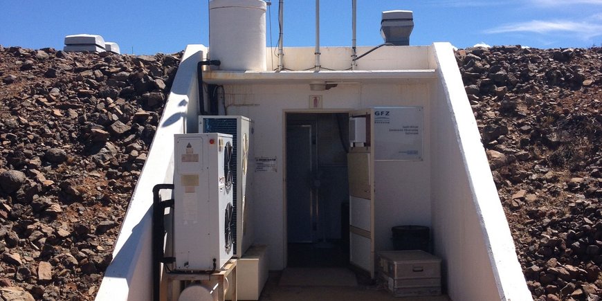 The photo shows the entrance to the South African Geodynamic Observatory Sutherland (SAGOS).