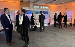 Poster exhibition at the Brandenburg Hydrogen Day at the GFZ, some participants in the foreground