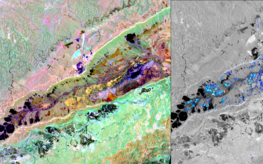 Satellite image of a desert area: Colorful spots show different minerals.
